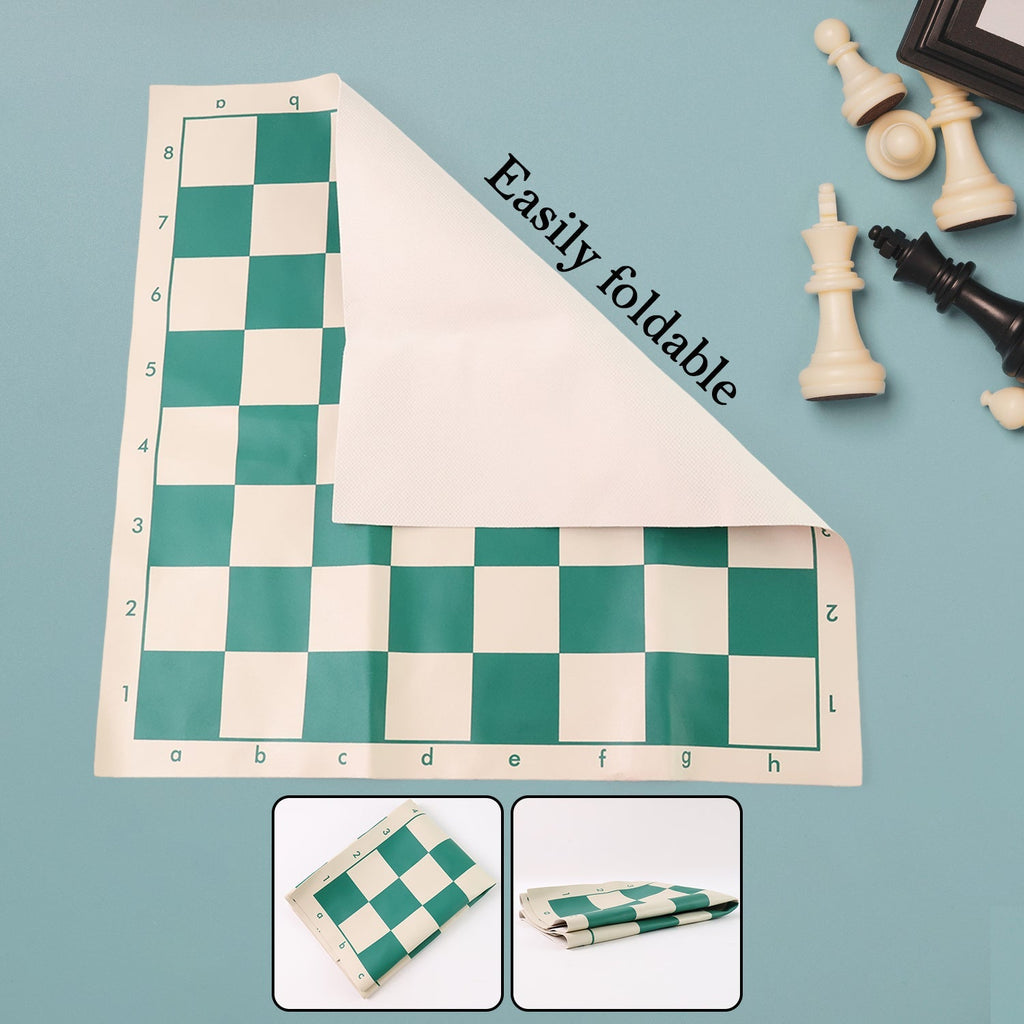 Portable vinyl chessboard spread out with plastic chess pieces arranged