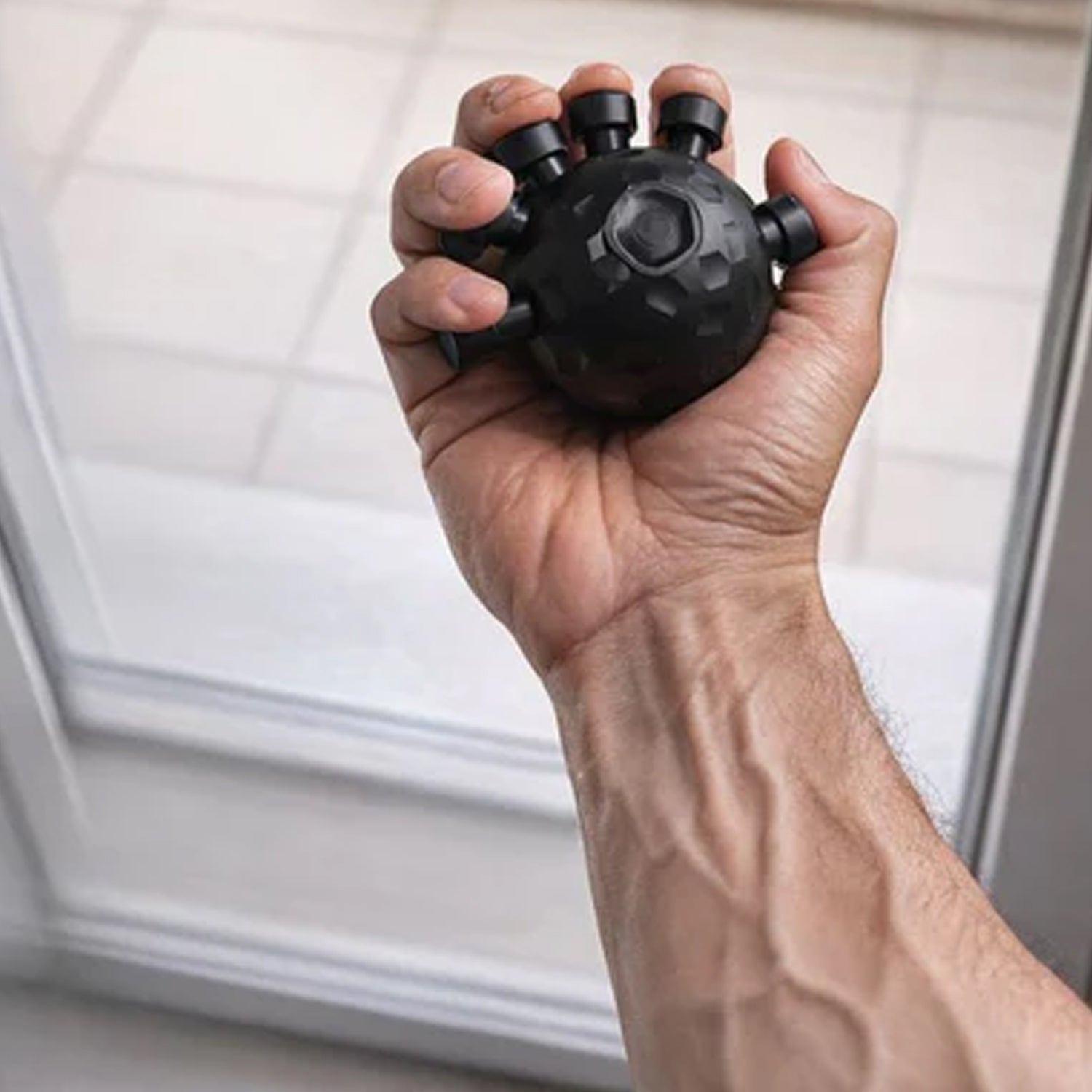 Portable grip trainer ball for home workouts