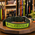 Heavy duty nylon dog collar with metal buckle and reflective stripe.