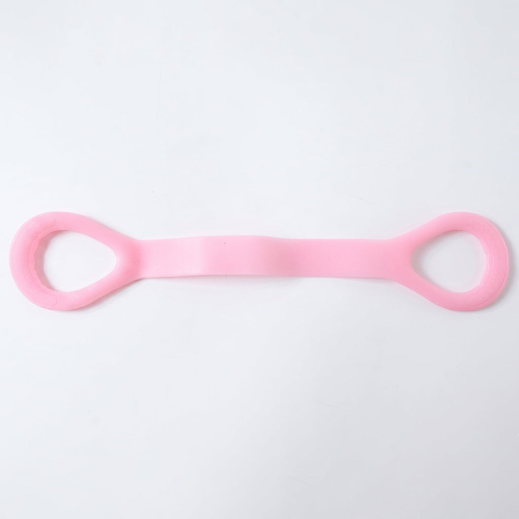 Woman using resistance band for arm exercises during workout