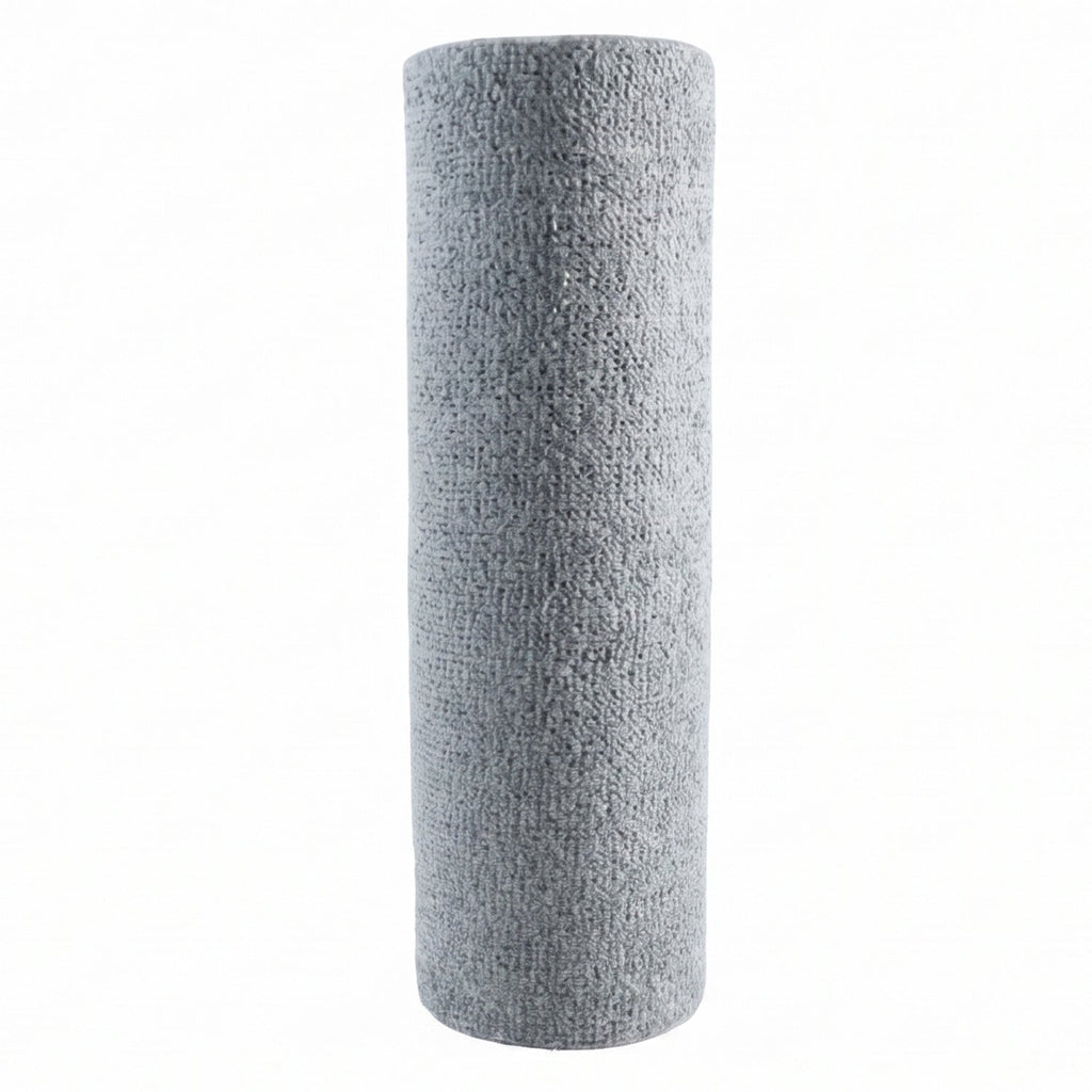 Absorbent kitchen towel roll with perforated tear off sheets