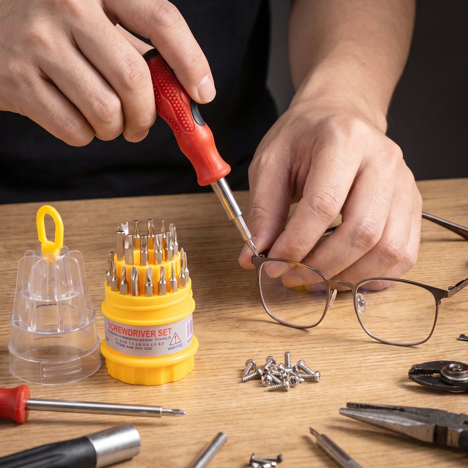 Screwdriver set with assorted bits for watches and devices